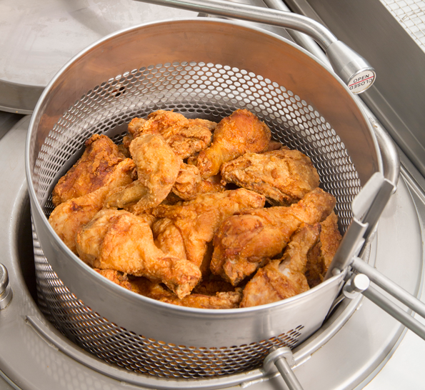 Full fryer basket of Genuine Broaster Chicken